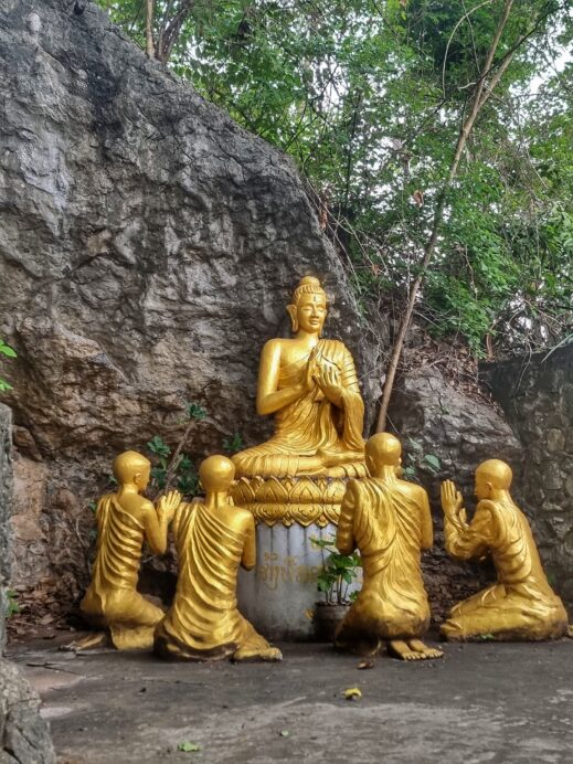 Golden-Teacher-at-Phousi-Hill-519x692 Why You Should Climb Phousi Hill in Luang Prabang Laos